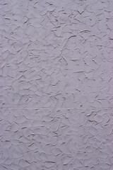 Purple textured stucco wall