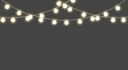 Festive hanging string lights with warm glowing bulbs on a gray backdrop.