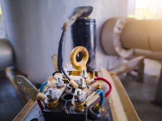 Close up the terminals cables power in 1 phase electrical motor capasitor.