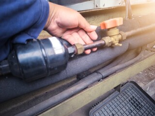 Checking the dryer filter and refrigerant pipe lines of the air conditioning HVAC.