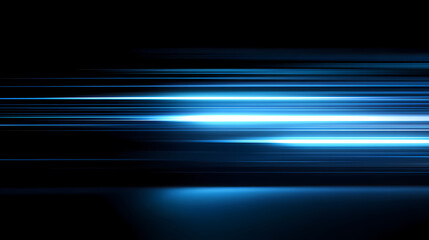 Abstract blue light streaks across a dark background, creating a sense of movement and energy