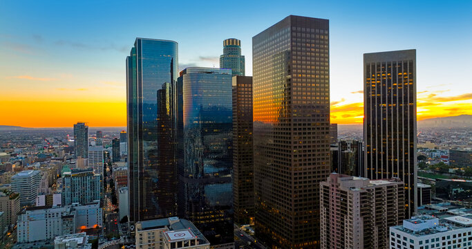 Aerial drone view of downtown Los Angeles with skyscrapers. Los Angeles skyline panorama. Aerial shot of LA city center. Cityscape of Los Angeles, California. Drone view of Los Angeles landscape.