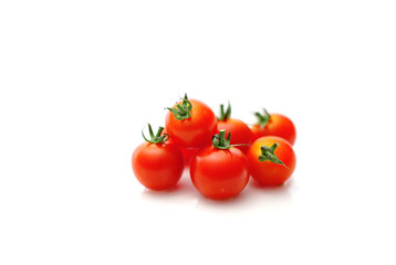 Cherry tomatoes isolated on white background.
