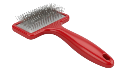 Red slicker brush for pet grooming isolated on transparent background