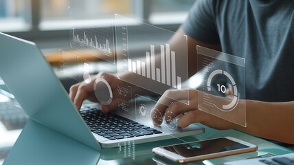 Business analyst working on laptop with holographic dashboard charts and data visualization graphs. Concept of big data, analytics, business intelligence, and financial statistics. crm marketing