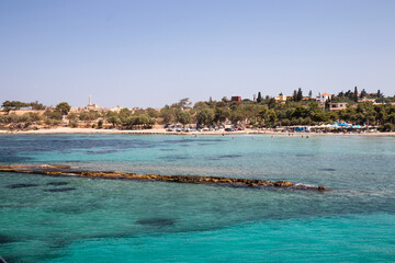 A coastline meets the blue sea. Beatiful nature view