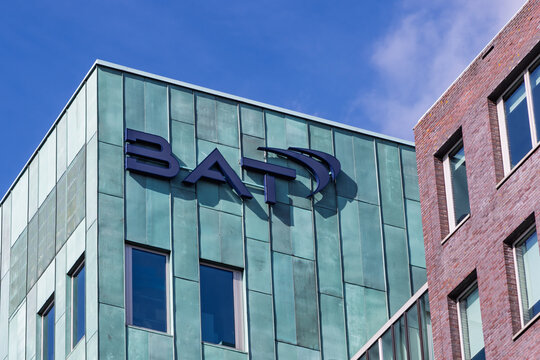 Close-up of British American Tobacco BAT logo on modern green copper office facade in Amstelveen, Netherlands, symbolizing global corporate identity. Amstelveen, Netherlands. 28 September 2025.