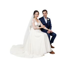 Bride and groom posing together at their wedding, showcasing love and joy in a beautiful celebration