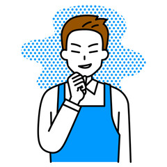 悪巧みをするエプロン姿の男性