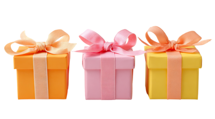 Three small gift boxes, coral, pink, and yellow, with matching pastel ribbons and bows