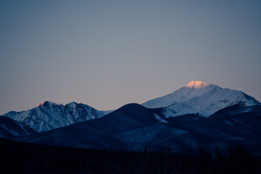 Sunset on ski slopes on Rocky Mountains in Winter Park, Colorado