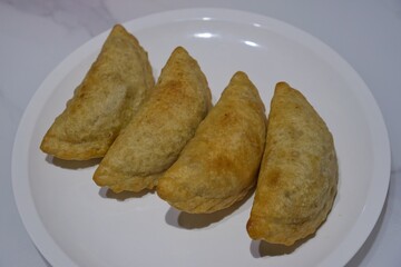 Spicy Beef Fat (Jando) Stuffed Cireng on Traditional Plate
