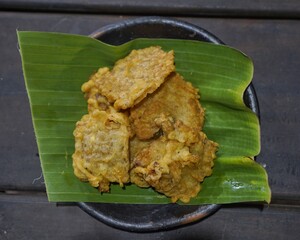 Traditional Fried Tempe on Banana Leaf for Indonesian Culinary and Food Photography
