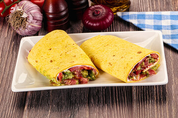 Burrito with tuna and vegetables wrap