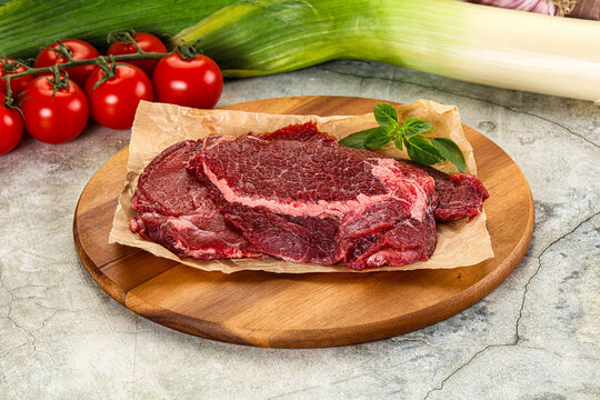Raw beef cheeks cut for cooking