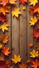 autumn leaves on wooden background