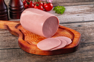 Boiled sausage with slices for breakfast