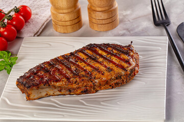 Grilled pork steak with bone