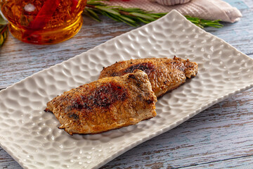 Roasted pork schnitzel steak piece