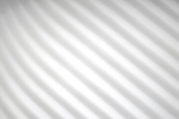 Fototapeta premium Minimalist abstract background featuring soft diagonal curved lines and bright white gradient. Ideal for clean digital backdrop, technology, modern design, and subtle texture.