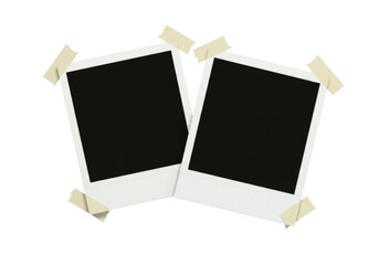 Two instant photo frames taped to a surface transparent background cutout png