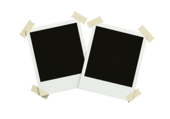 Two instant photo frames taped to a surface transparent background cutout png