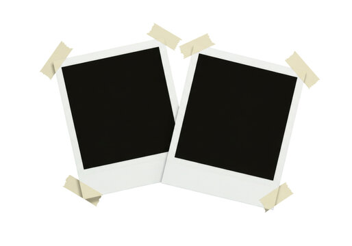 Two instant photo frames taped to a surface transparent background cutout png