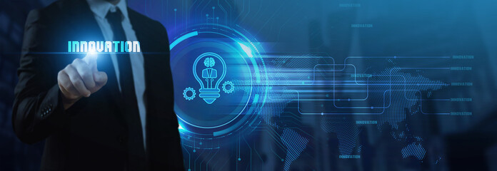 Obraz premium Businessman interacts with a futuristic INNOVATION interface featuring a lightbulb with a brain and gears, symbolizing creative ideas, artificial intelligence, and the future of technological 