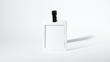 White luggage tag isolated with a black strap