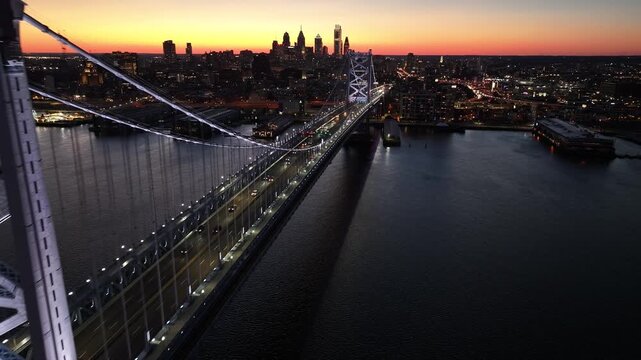 Sunset Skyline In Benjamin Franklin Bridge At Philadelphia In Pennsylvania United States. Highrise Buildings Landscape. Colorful Sunset. Philadelphia At Pennsylvania United States.