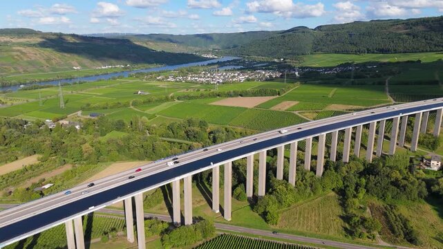 Moselle Viaduct Longuich, vineyard in Mosel valley, bridge of highway crossing river near Trier, german autobahn, aerial view