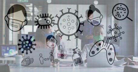 Collaborating masked office workers reviewing data at meeting table, with laptops and health icons