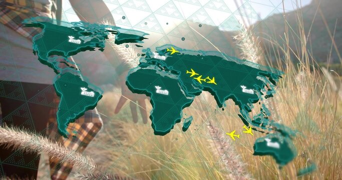 Displaying tablet user viewing world map overlay in meadow with shopping cart and airplane icons