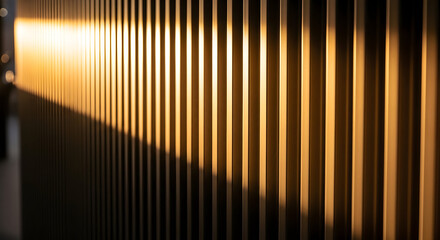 Abstract Pattern of Golden Light and Shadows on a Textured Metallic Surface Creating a Warm and Inviting Atmosphere in an Urban Setting