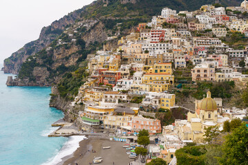 Colorful houses cling to the steep Amalfi Coast