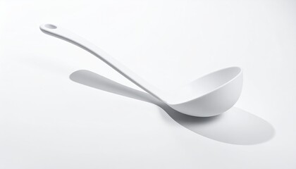 White ladle, angled, creates a stark shadow on white