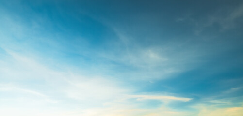 Fototapeta premium the sky is clear blue with fluffy white clouds, the sky is very bright, and the sun shines.