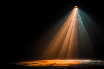 Dramatic stage spotlight with vibrant orange and blue beams cutting through smoke.