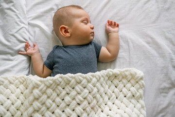 Close-up baby sleeping. three month old child boy asleep. Closeup infant napping