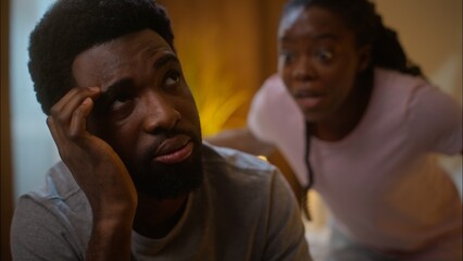 Obraz premium African American family fight crisis argument problem quarrel marriage couple divorce angry mad woman wife shouting yell scream sad guilty man husband cheating jealousy betrayal at home bedroom night