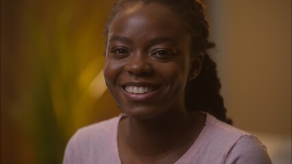 Happy wide smiling African American ethnic woman female lady girl client turning head smile looking...