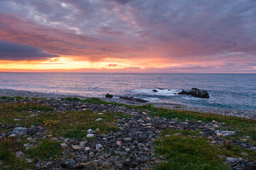 Russia, Murmansk region, Rybachy Peninsula. Sunset on the Barents Sea coast. August 2025