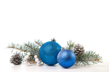 Christmas card with fir branches and Christmas decorations. Copy space