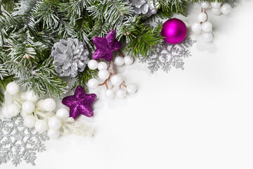 Christmas card with fir branches and Christmas decorations