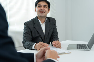 business man explain application documents and resume for match the position. company publishes...