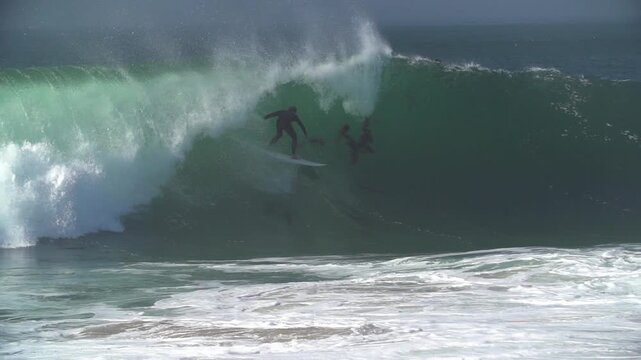 Surfer getting a perfect barrel