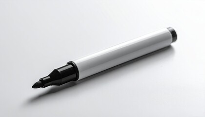 White marker, black tip and cap, on a white surface