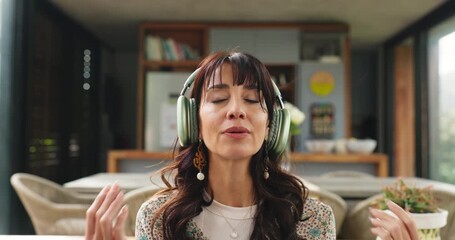 Yoga, woman or breathing with headphones in home for sound meditation, mindfulness or healing audio. Yogi, person and relax with zen music on sofa for anapanasati, stress relief or spiritual wellness - Powered by Adobe