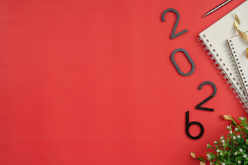 New Year 2026 background with decorative elements and notebook