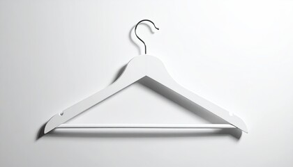 White wood hanger, silver hook, suspended against white wall